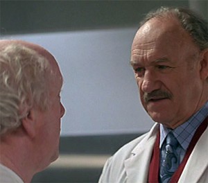 Dr. Myrick (Gene Hackman) speaks with a homeless research patient who thinks he's at the hospital for minor routine treatment. (from Extreme Measures)